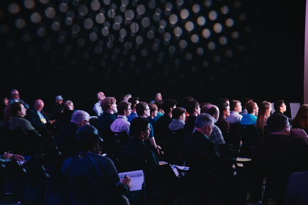 International conference hall with business professionals at an IBCE Solutions event